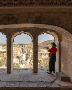 Female traveler at Katas Raj temple on a Pakistan women's tour