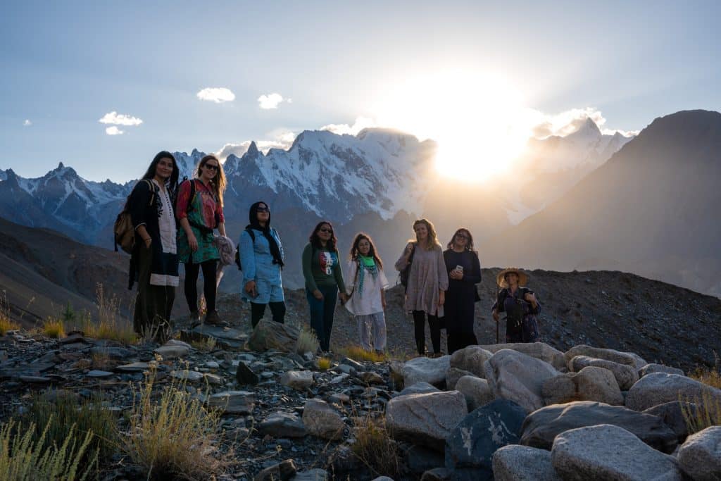 Women trekking in the mountains around Passu, Gilgit Baltistan, Pakistan