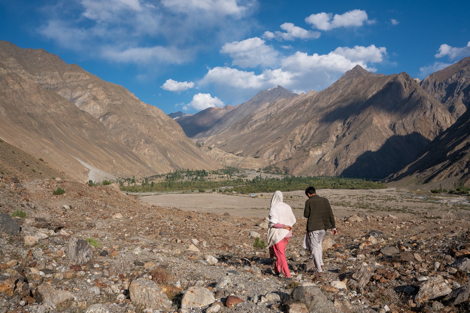 Couple walking in Darkot, Pakistan