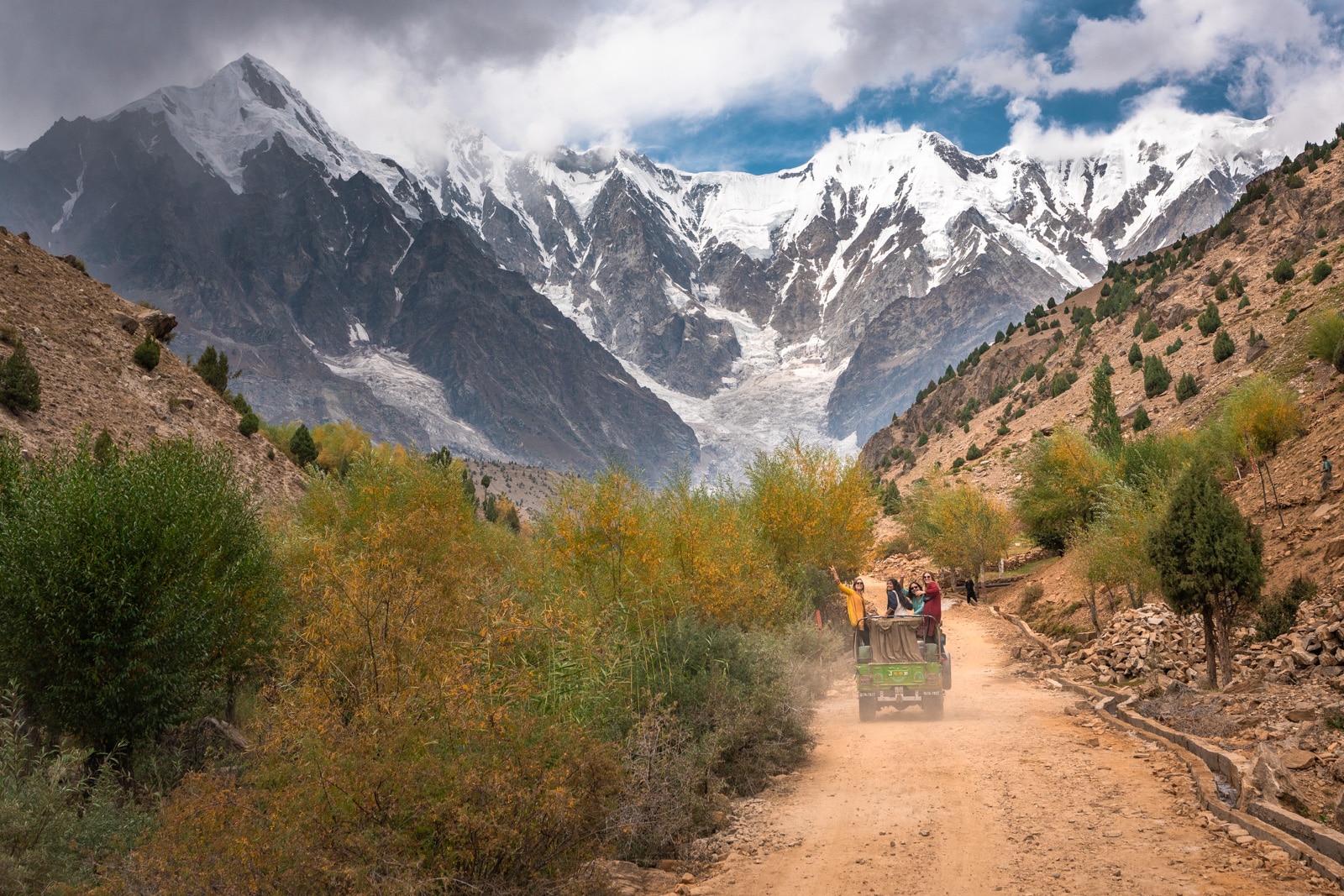 Girls riding in a jeep to Astore and Nanga Parbat on a women's tour of Pakistan