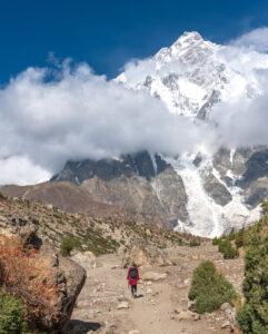 Female traveler trekking to Nanga Parbat Base Camp Rupal Face on a Pakistan women's tour