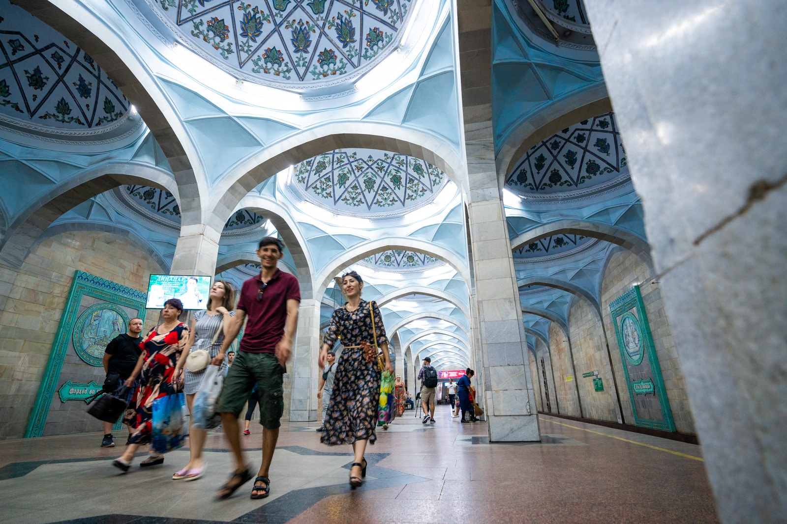 People walking in Alisher Navoi Metro station in Tashkent, Uzbekistan