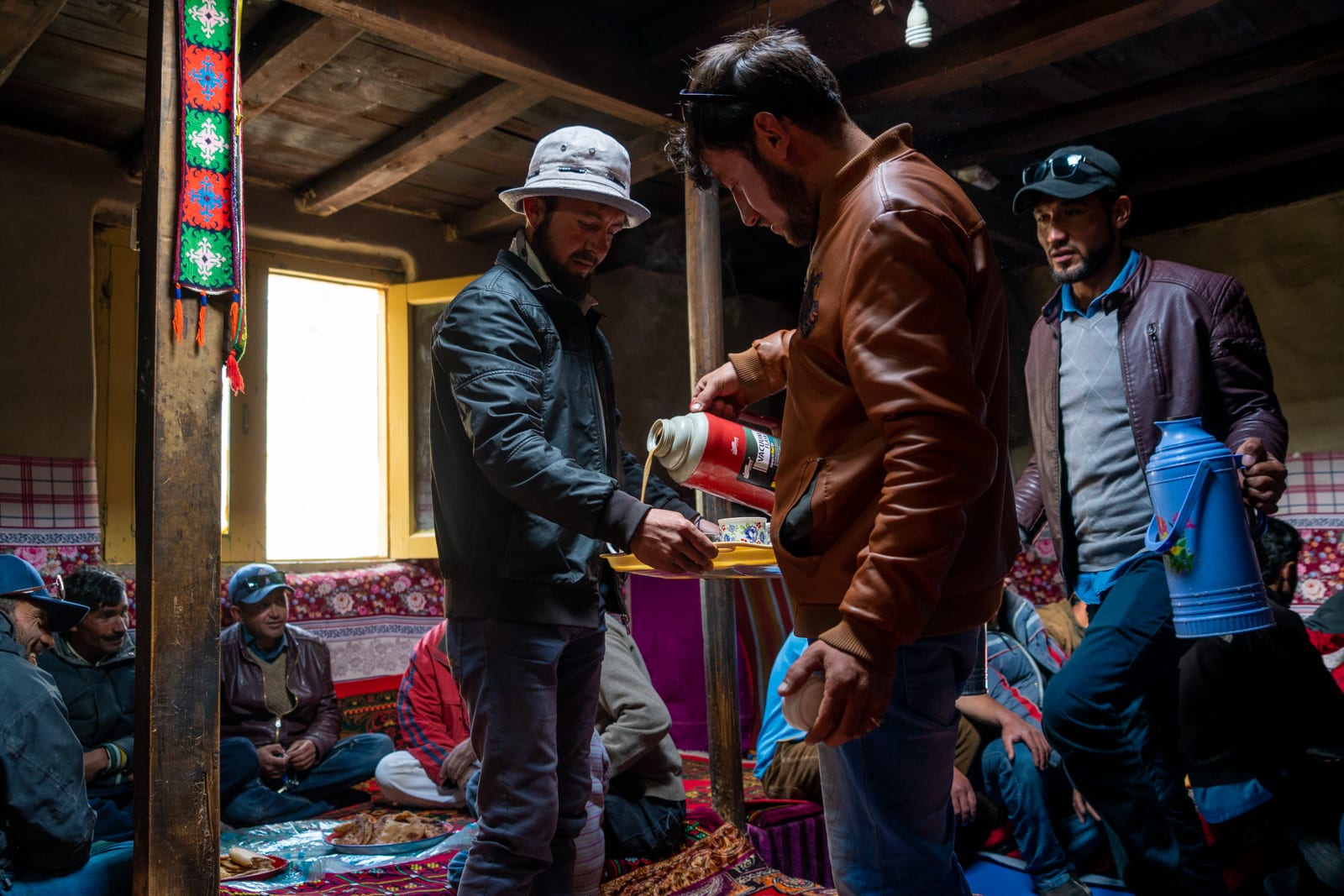 Tea with men in Chapursan, Pakistan