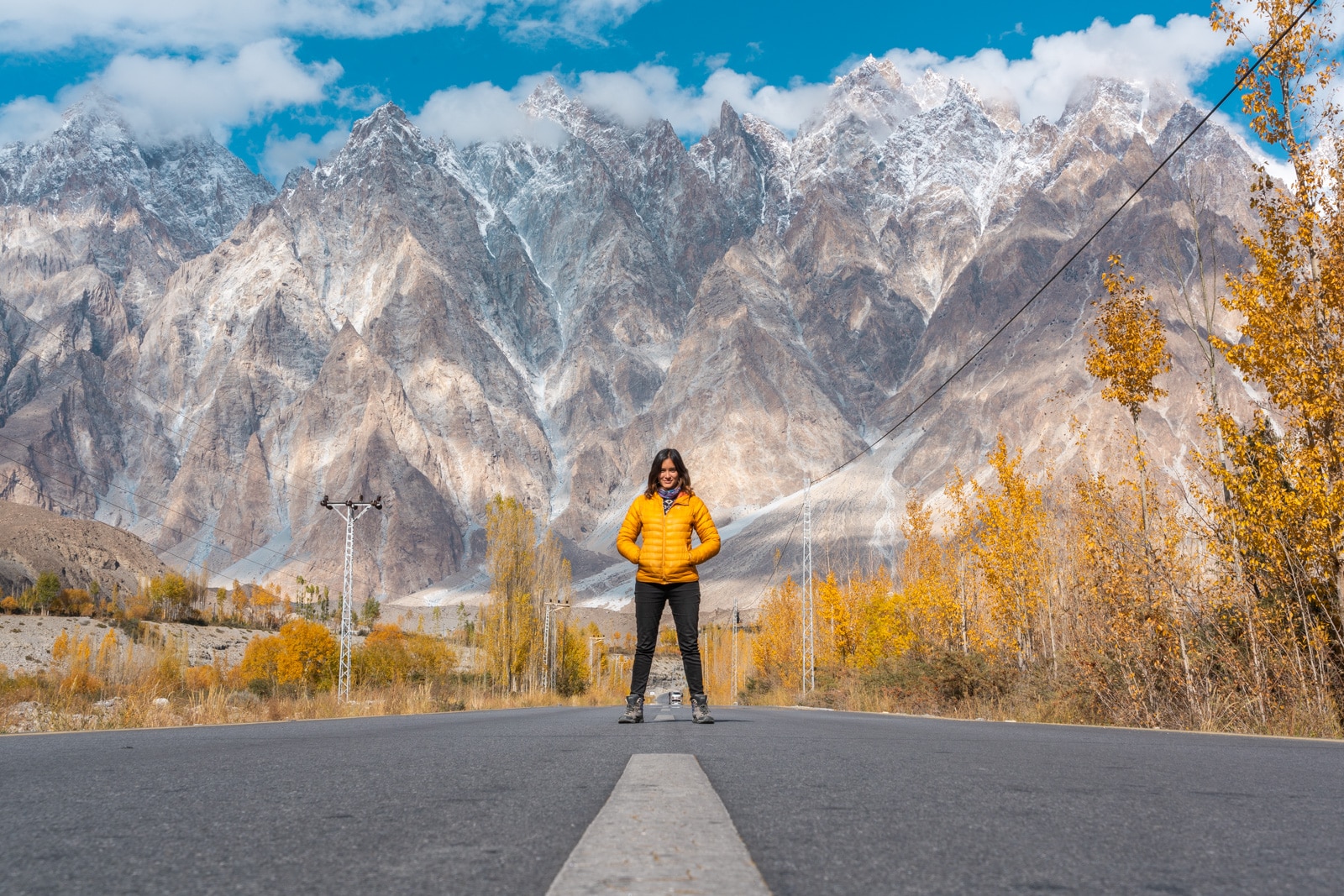 Female traveler wearing western clothes in the mountains of Hunza, Gilgit Baltistan, Pakistan