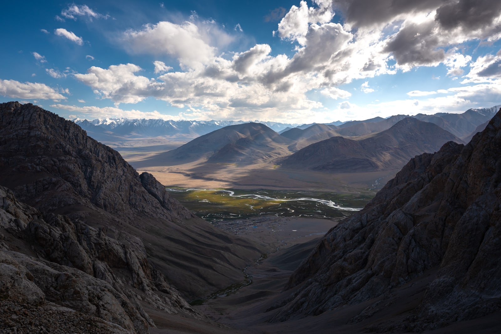 Sun rays over Shaimak Village in the Pamir mountains of Tajikistan