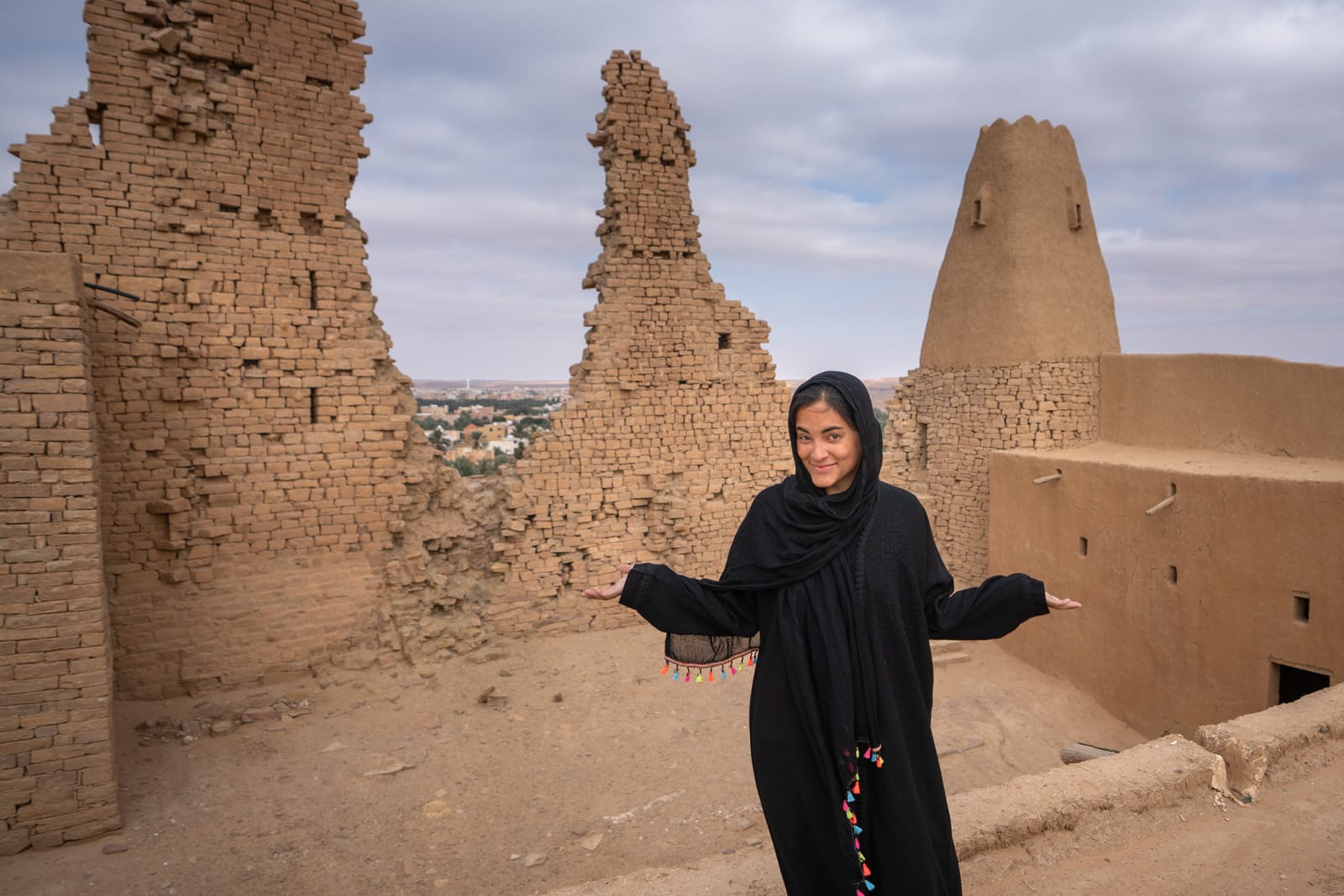 Female traveler in Marid Castle in Dumat Al Jandal, Saudi Arabia