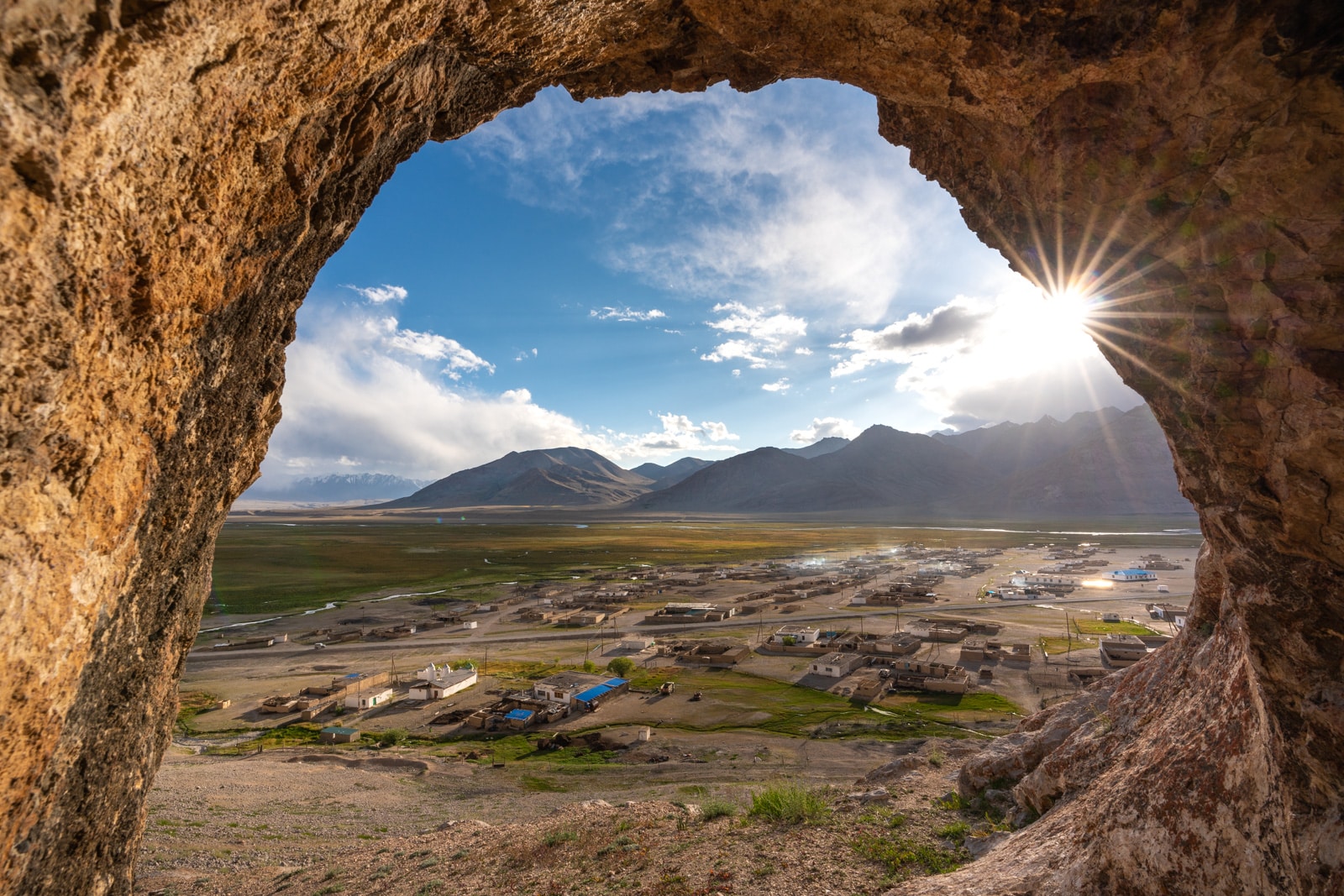 View of Shaimak at sunset from a cave above the village in the Pamir Mountains, Tajikistan