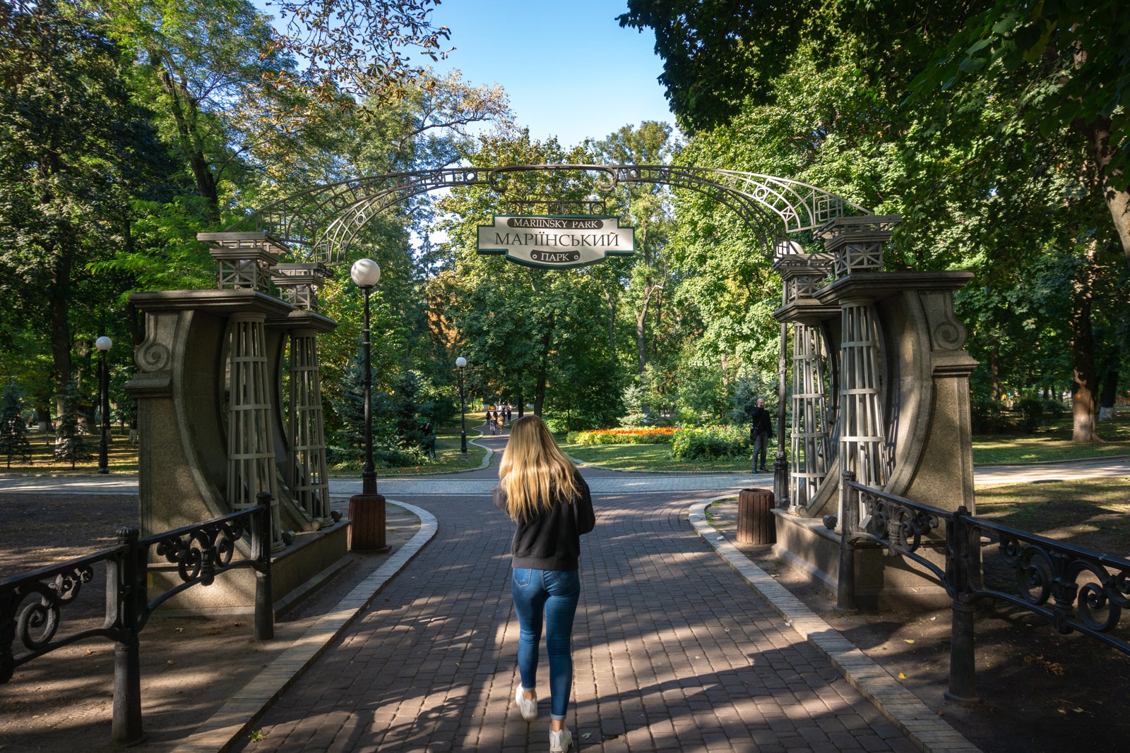 Girl walking in Mariinsky Park in Kyiv, Ukraine
