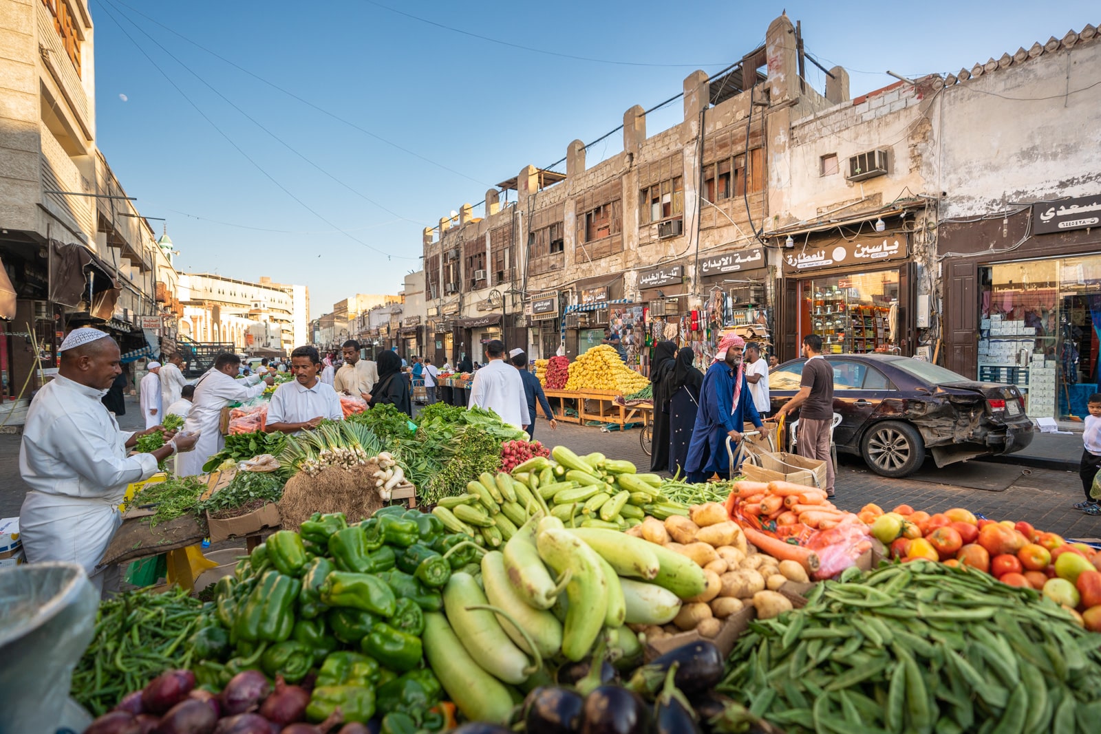 Vegetable vendors at a street market in Old Jeddah, Saudi Arabia