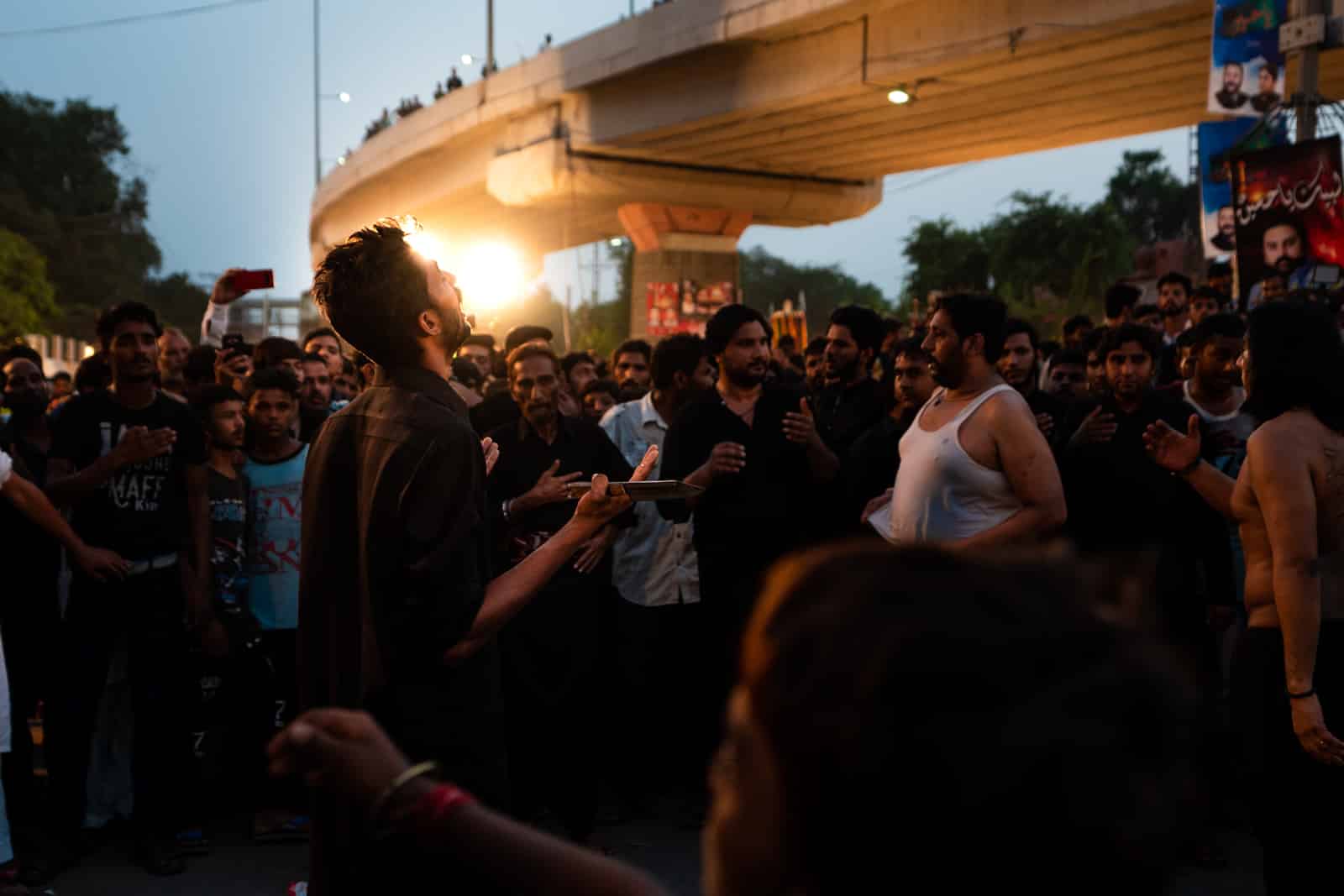 A Shia man praying during Ashura in Lahore, Pakistan