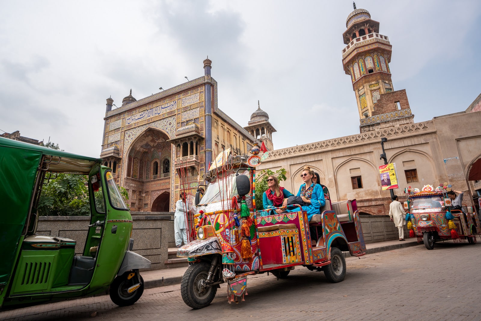 Female travelers in a Rangeela Rickshaw in Lahore, Pakistan