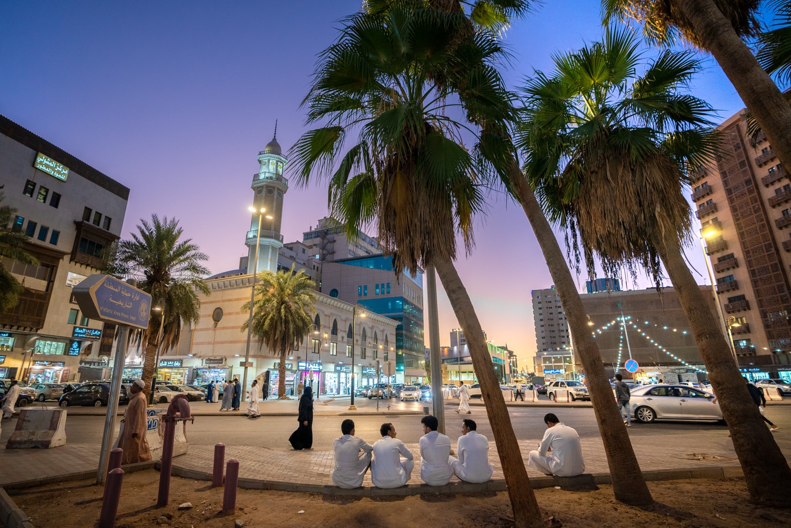 Men sitting on the street in Jeddah, Saudi Arabia