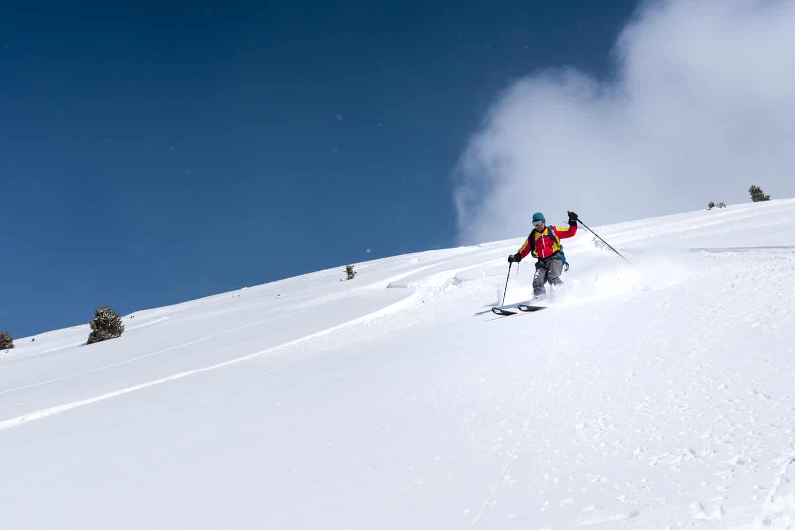 Backcountry skiing in powder in Boz Uchuk, Kyrgyzstan