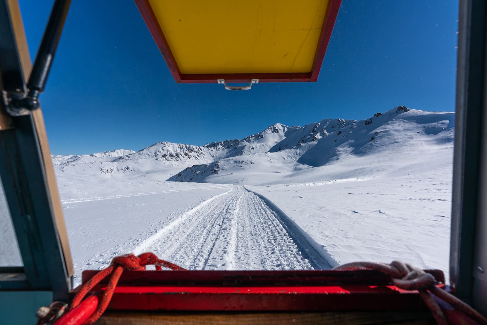 View of mountains from a snow cat for backcountry skiing near Jyrgalan, Kyrgyzstan in winter