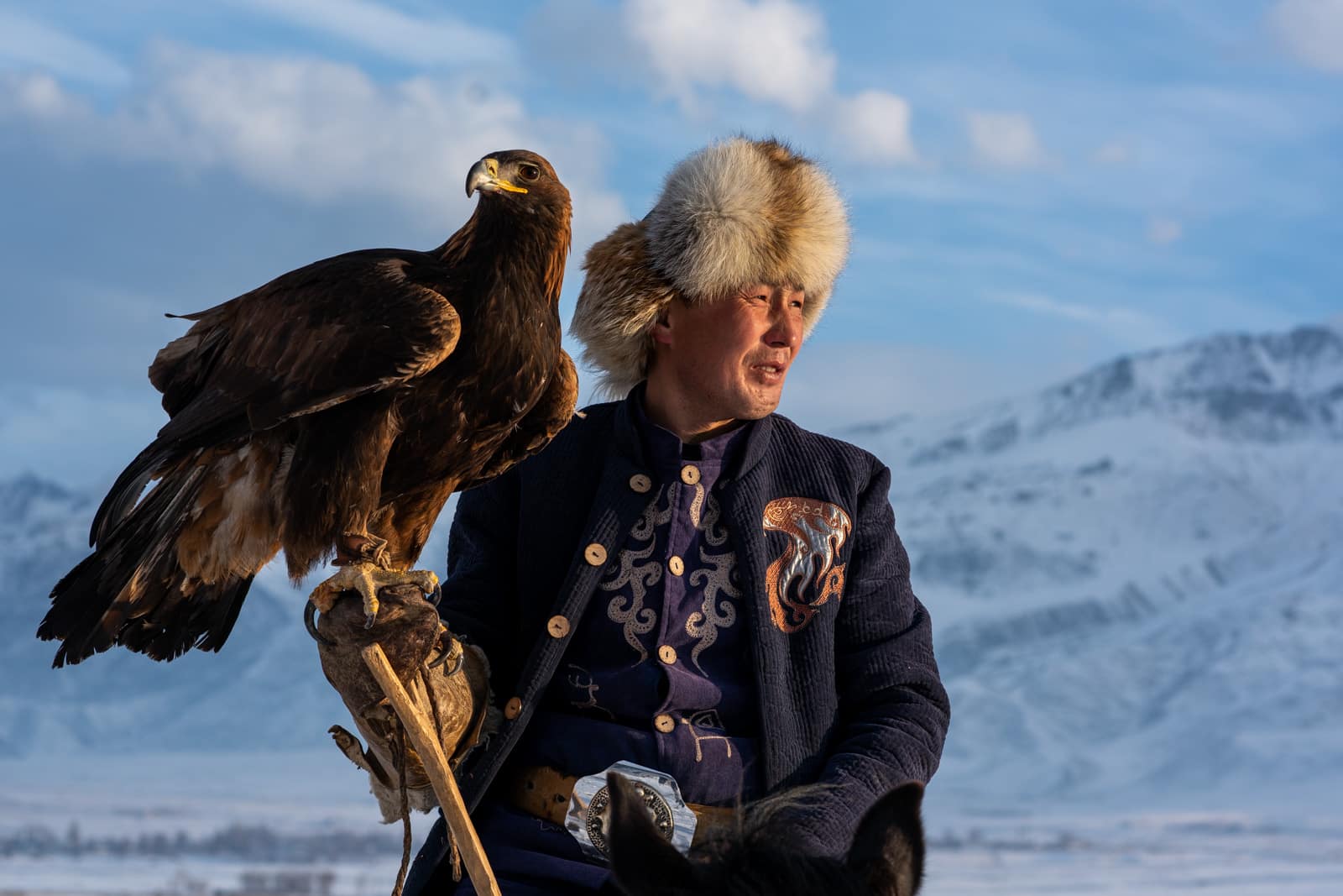 Salburuun eagle hunter in Kyrgyzstan in winter