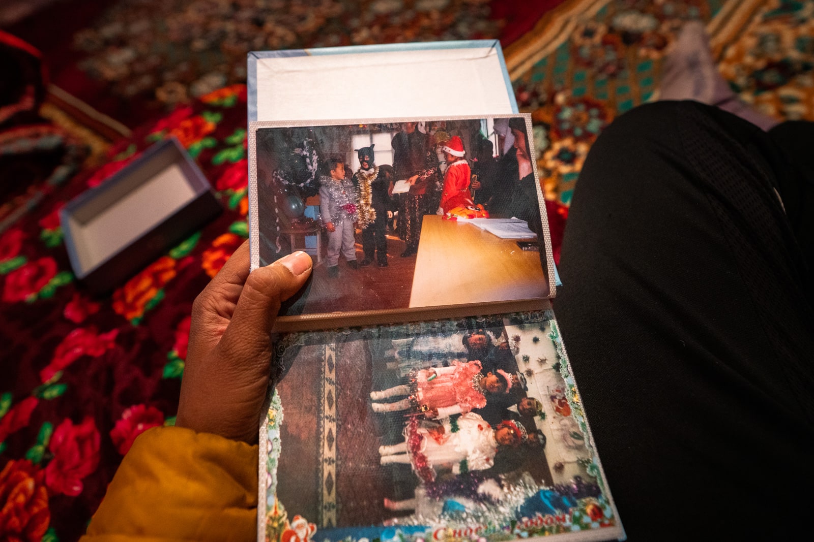 Christmas photos in a family album in Murghab, Tajikistan