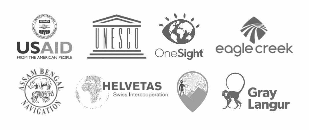 Logos of USAID, UNESCO, OneSight, Eagle Creek, Assam Bengal Navigation, Helvetas, Greener Pastures, Gray Langur