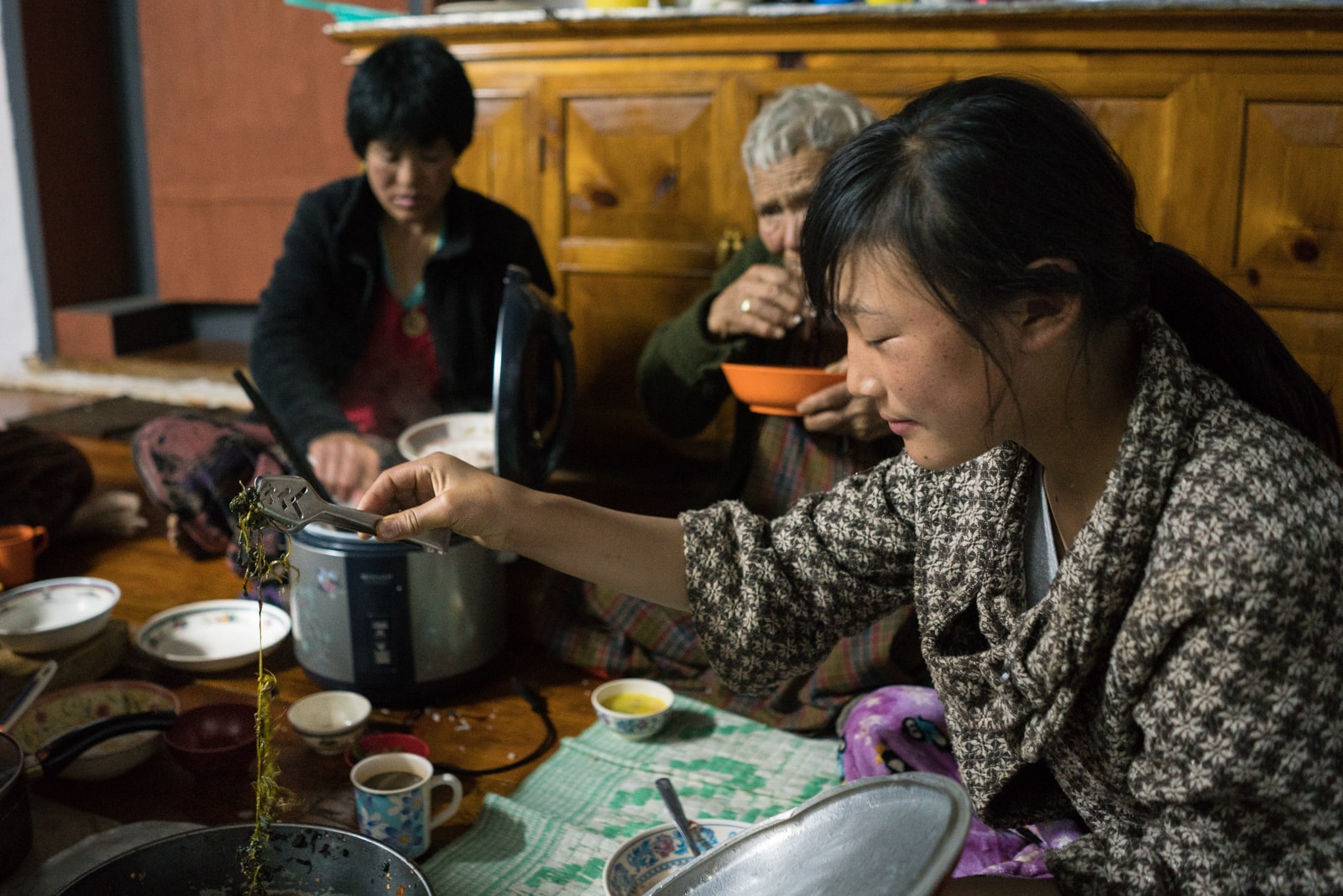 Dinner with a homestay family in Phubjika Valley, Bhutan