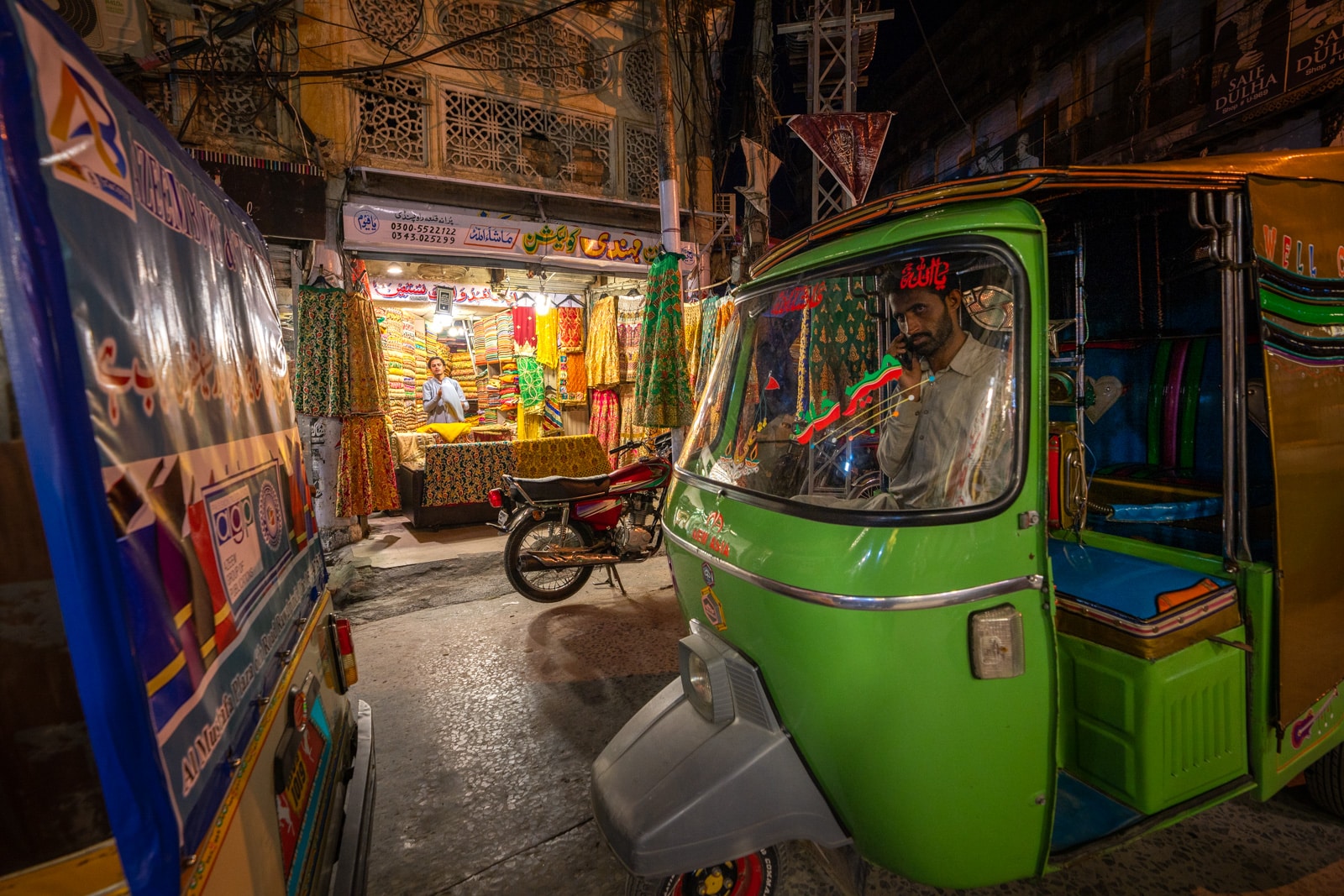 Rickshaw driver on a street in Rawalpindi, Pakistan