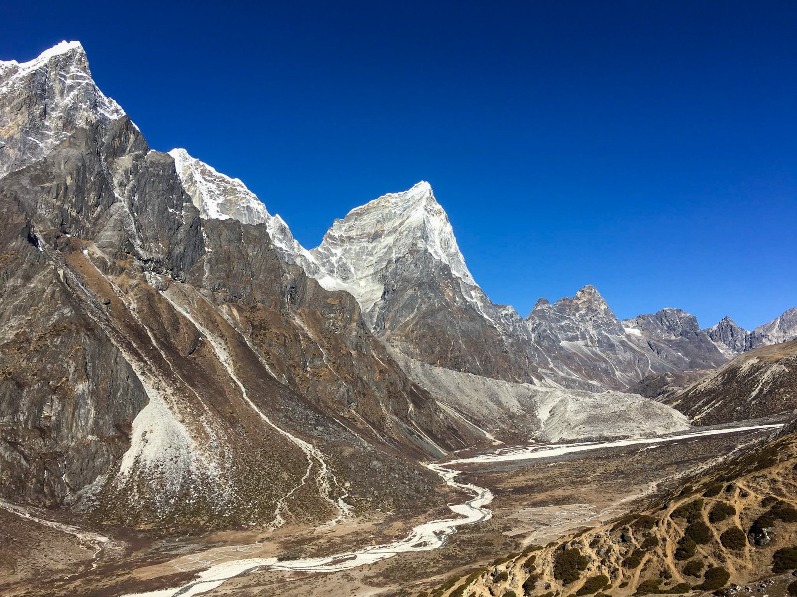 Mountain-lined valley near Dughla along the Everest Base Camp trail in Nepal