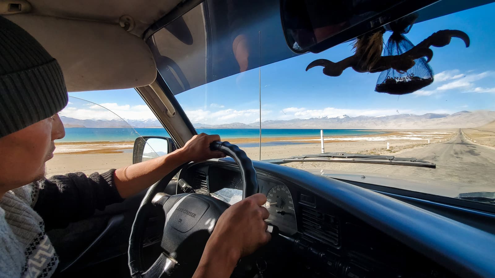 Driving past Karakul Lake in Tajikistan