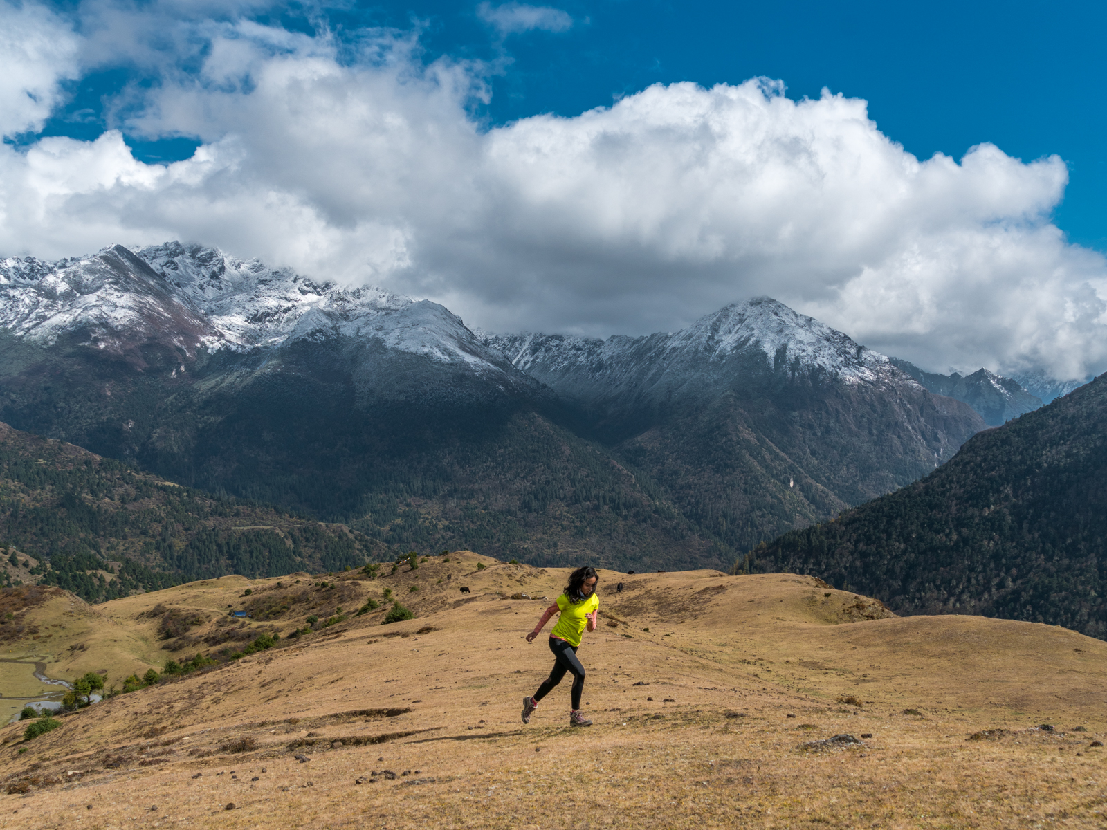 Alex running at high altitudes in the Himalaya Mountains of Bhutan