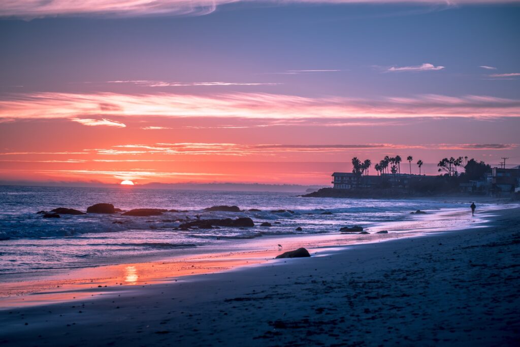 Colorful sunset over a beach in Malibu, USA