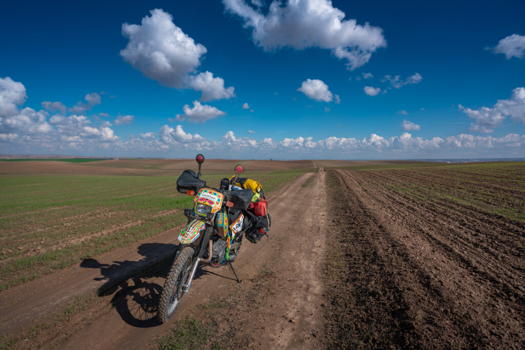 Motorcycle travel in Iraq offroad in farm fields in the Kurdistan region