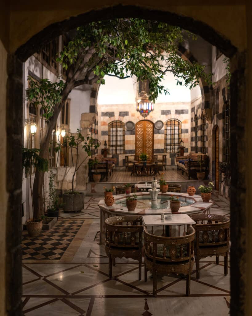 Atmospheric courtyard of a traditional Damascus house-turned-hotel
