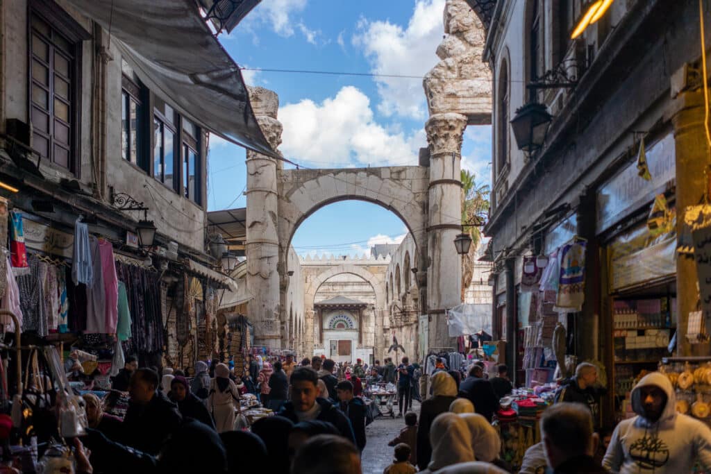 Busy Al-Hamidiyeh souq in Old Damascus in front of the Umayyad Mosque